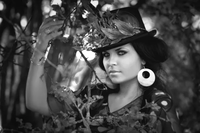 The portrait in black and white with a clearer face and softer, darker corners from the Holga recipe.